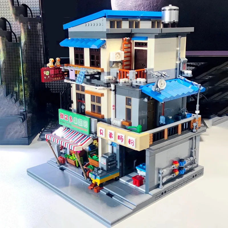 kf Se311f43ebb3b4679a3a4aa6c7dba1449C XINGBAO 01037 Chengzhong Village Noodle Shop Model City Modular Street View Series DIY Toys Building Blocks - XINGBAO Blocks